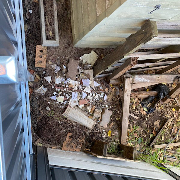 Asbestos debris found at rear of property