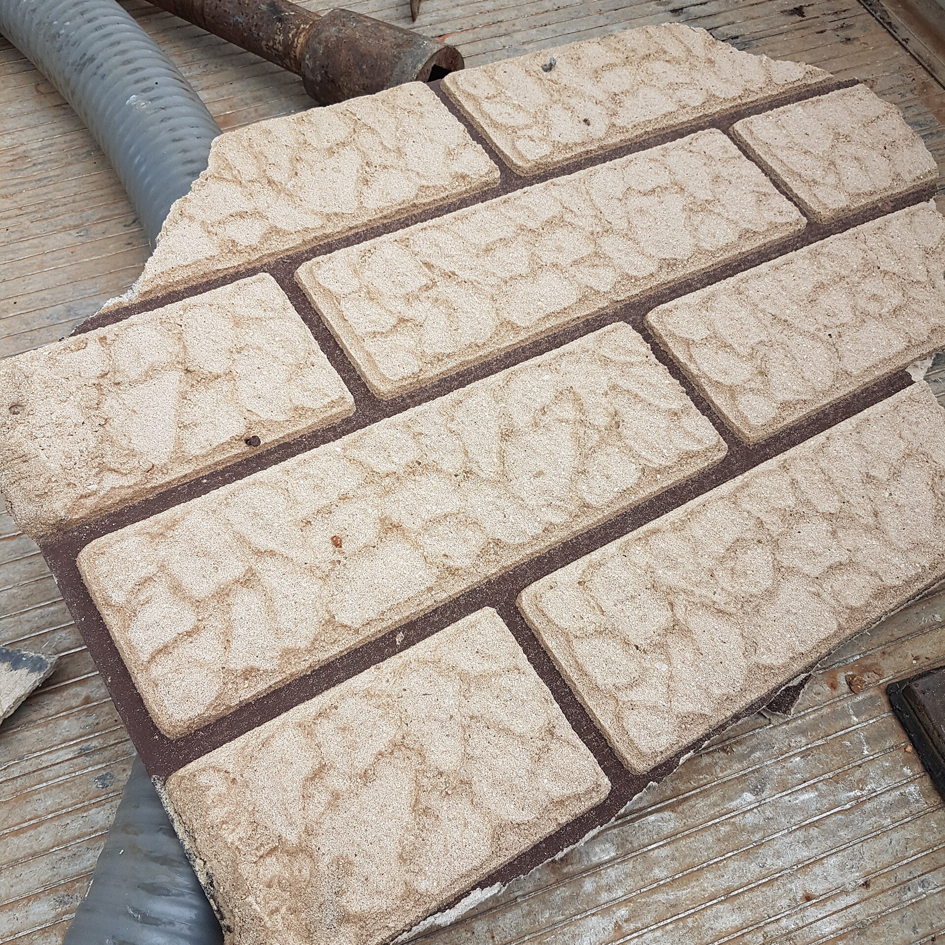 Asbestos faux brick wall cladding