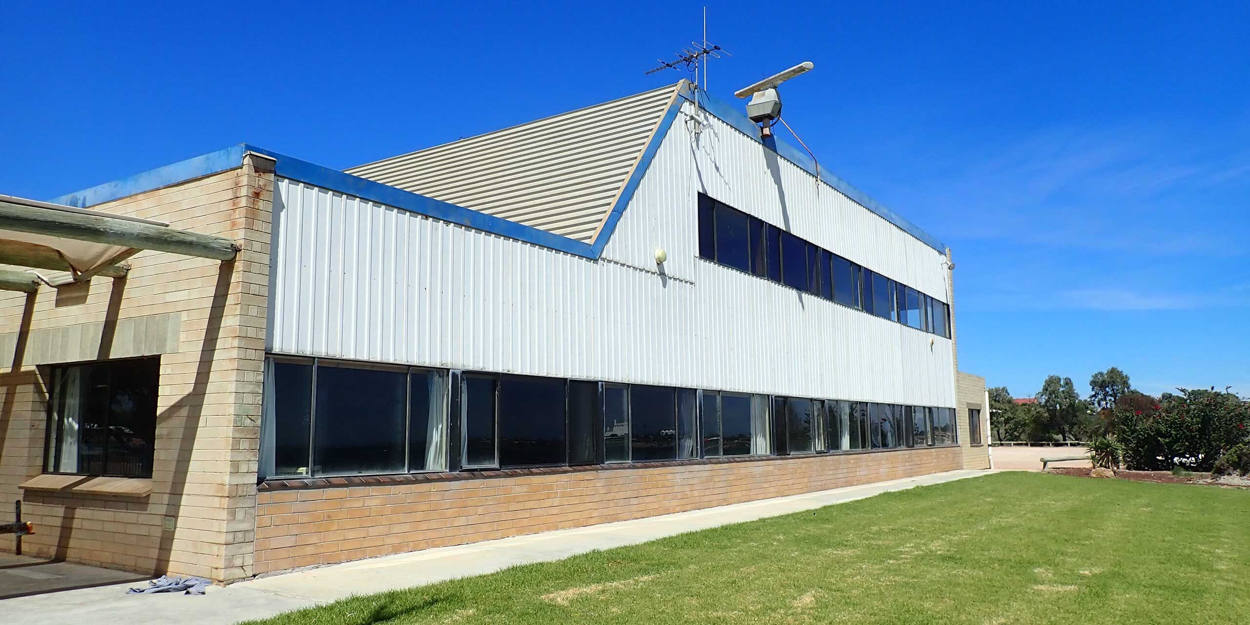Commercial building with “Shadowline” asbestos cement cladding