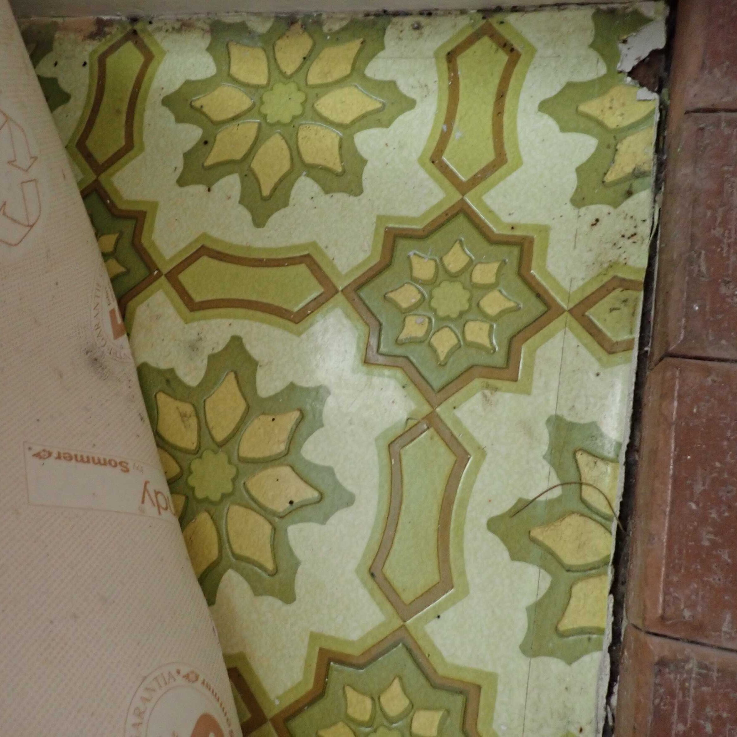 Hidden asbestos-backed vinyl flooring discovered during asbestos inspection