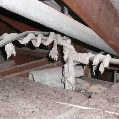 Hot water pipe with asbestos insulation