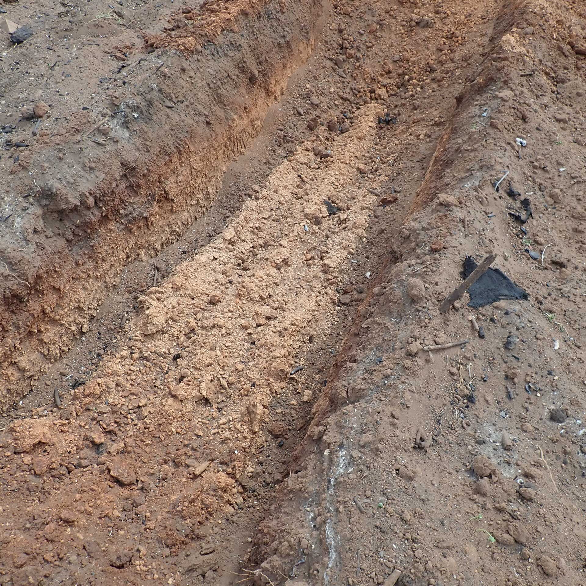 Testing pit for asbestos in soil assessment - Hazardous materials inspection - Adelaide